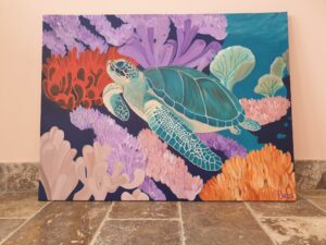 Schildpad tussen koraal